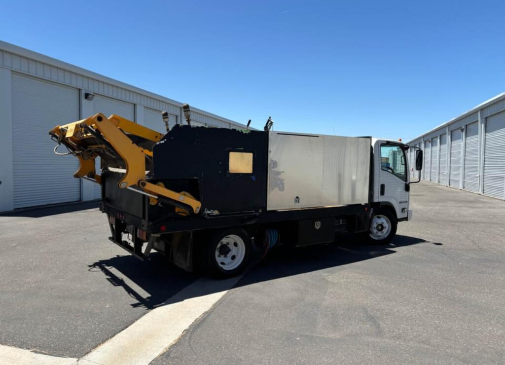 Garbage can cleaning truck

