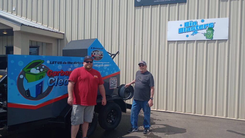 Customers picking up their bin cleaning trailer