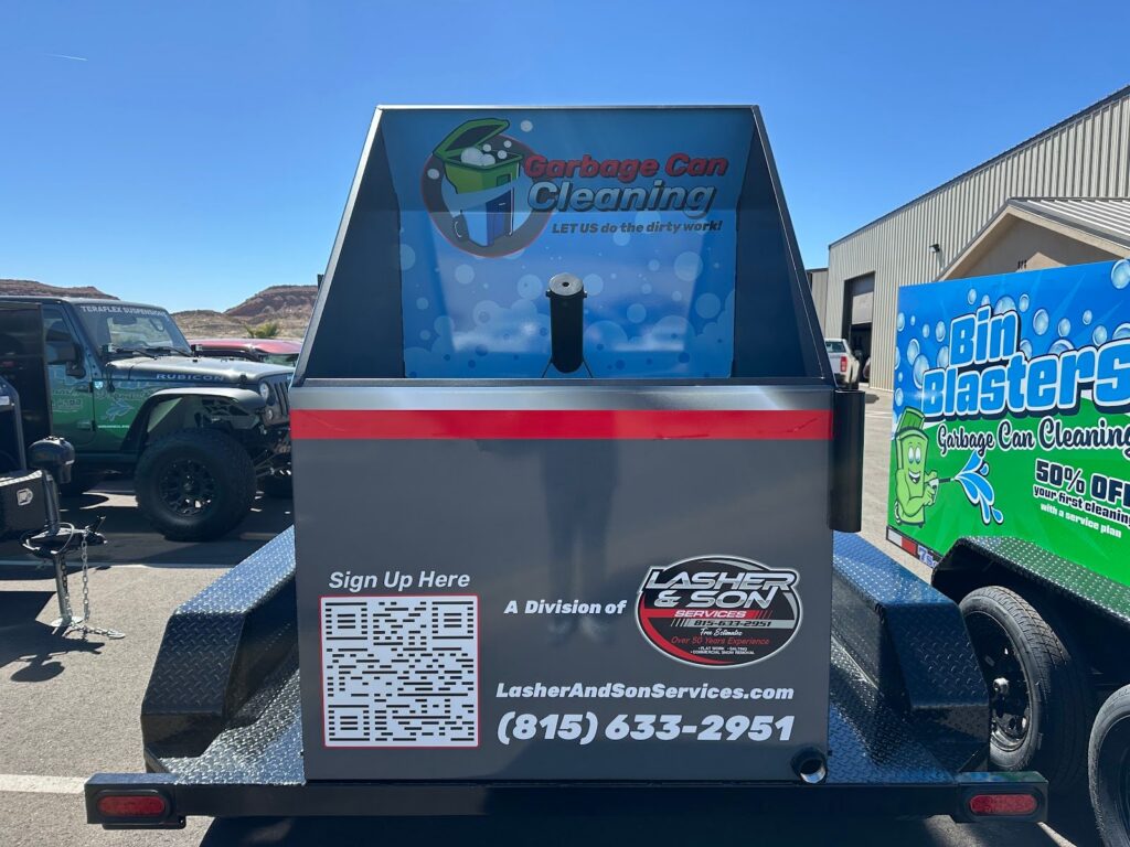Custom wrapped bin cleaning trailer
