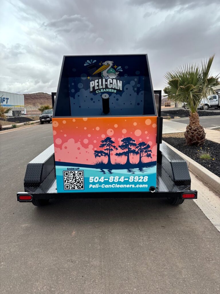 Custom wrapped bin cleaning trailer